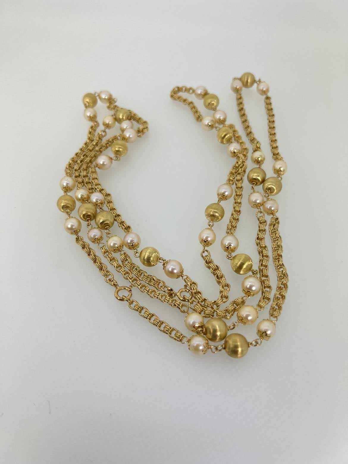 Lunga collana in Oro 750/°°° con Perle in stile ” Chanel”